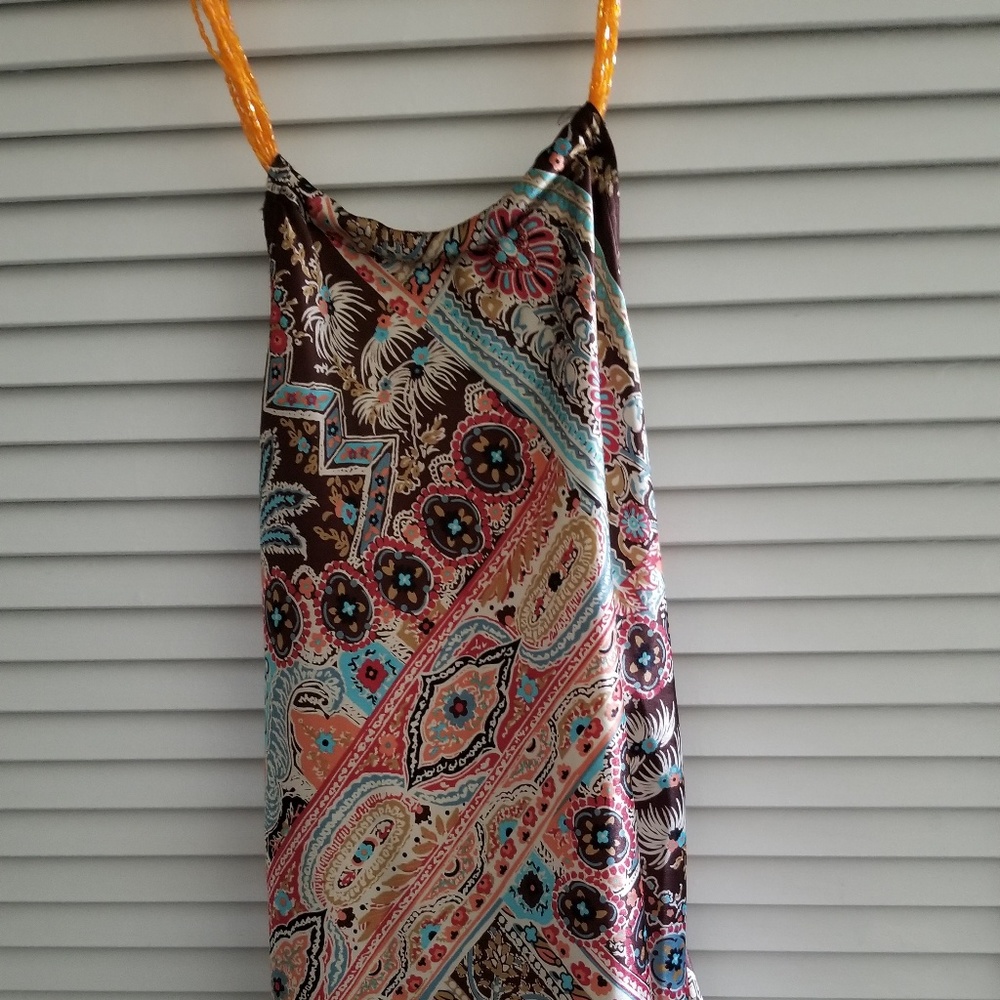 Brown patterned top with orange beaded neckline